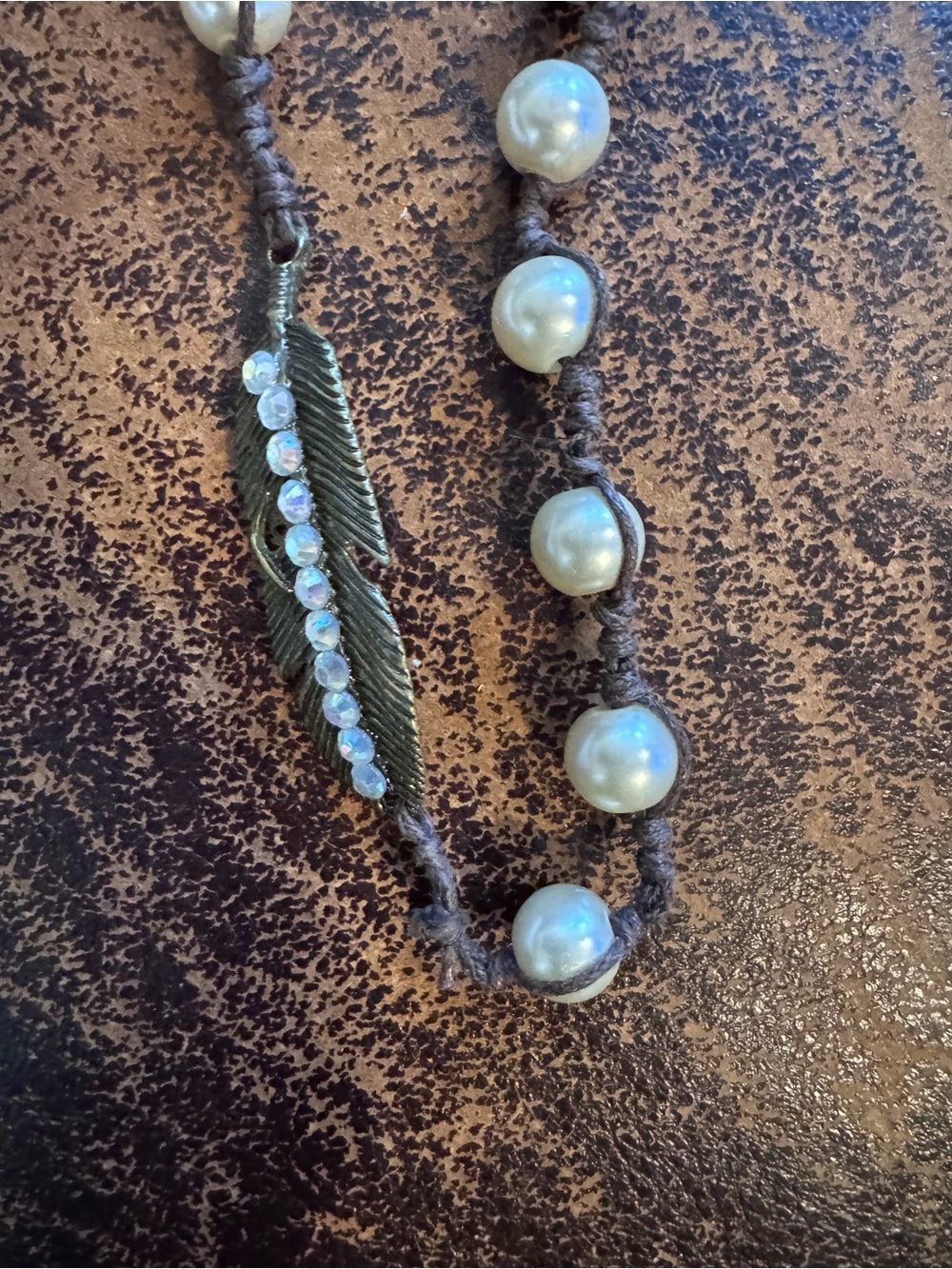 A Rare Bird Handknotted Pearl Necklace in Cream on Brown Cord - Picture 2 of 3
